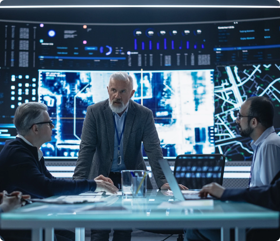 Team meeting in high-tech control room